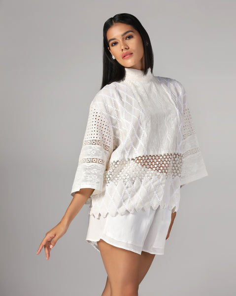 Ivory embroidered lace top with scalloped hem and textured high-waist shorts