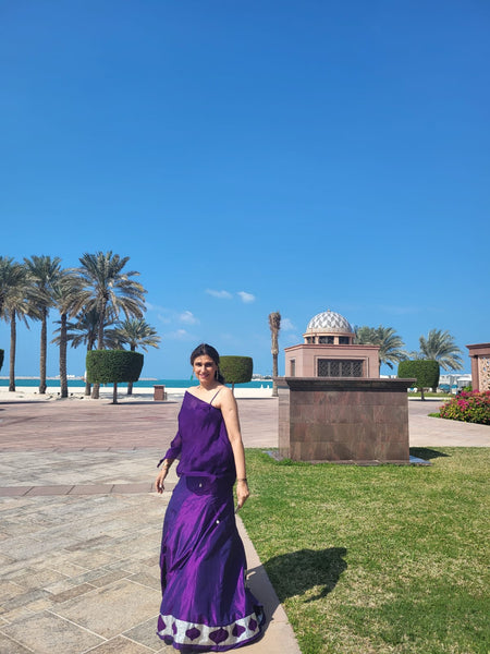 Purple Silk Skirt Lehnga with Purple Bustier/ With Asymmetrical Top In Chinos With Patti Work Application